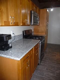 Gurmet Kitchen with high-end stainless appliances, 5 flame gas stove, french door fridge, dishwasher, Microwave