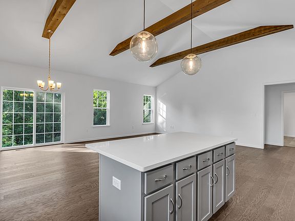 Kitchen with center island of the Dalton Model from Garman Builders