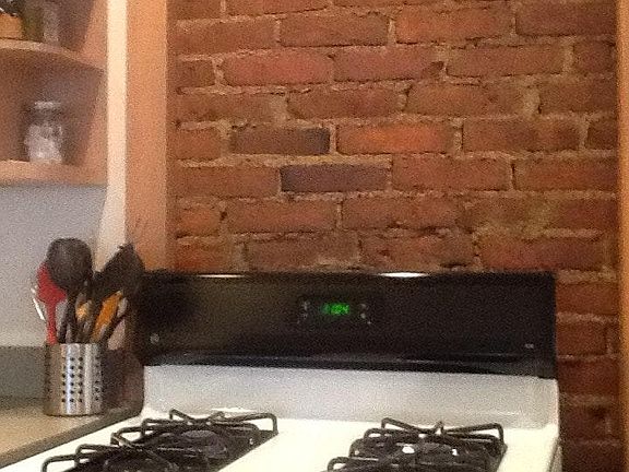 exposed brick kitchen