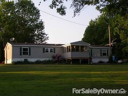 Front of House
						:
						Includes wooden swingset.