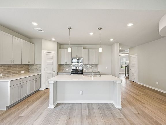 The Texoma floorplan in Magnolia Place of Magnolia, TX.