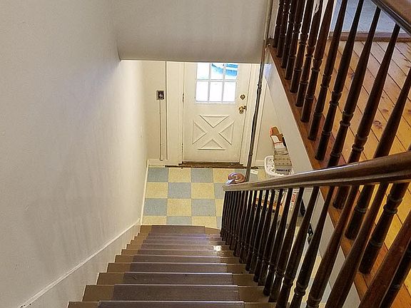 This is the view from the upstairs. There is room for bikes, coats, boots, umbrellas and the like in the entryway downstairs. It is secured.