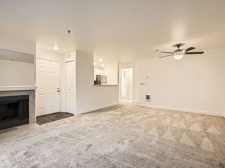 A Premium 1 Bedroom 1 Bath Kitchen & Living Room at Brookhaven Apartments in Federal Way, Washington