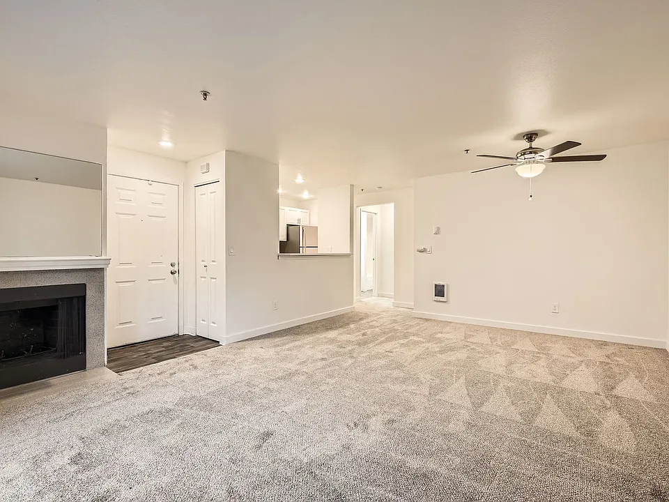 A Premium 1 Bedroom 1 Bath Kitchen & Living Room at Brookhaven Apartments in Federal Way, Washington