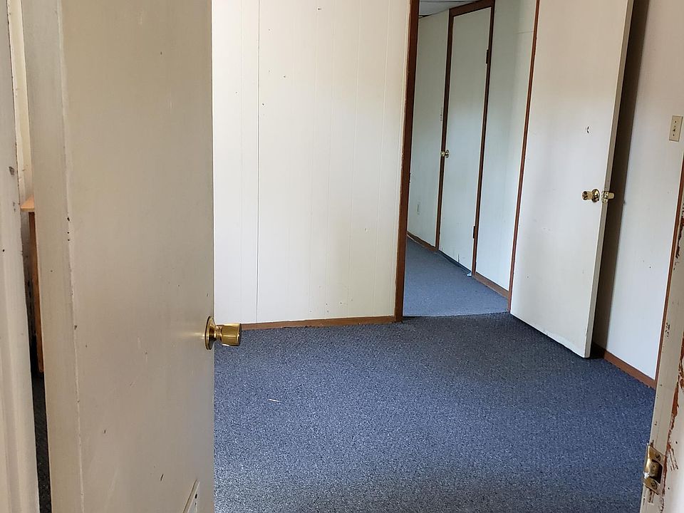 Kitchen looking into 1st bedroom