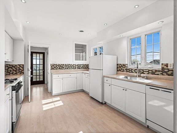Kitchen with all new paint and lighting