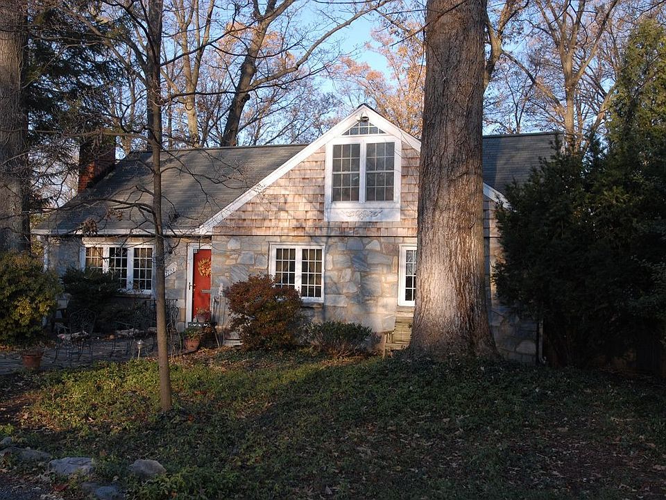 Front exterior. Field stone and cedar shingles.