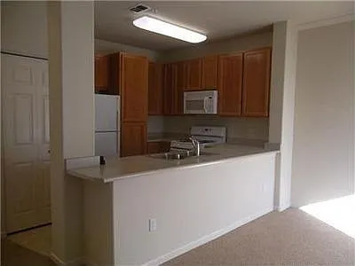 5201 Laguna Oaks Dr #32 — Photo 1