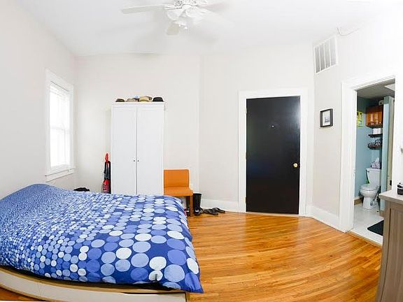 View of east bedroom from west bedroom door adjoining dining