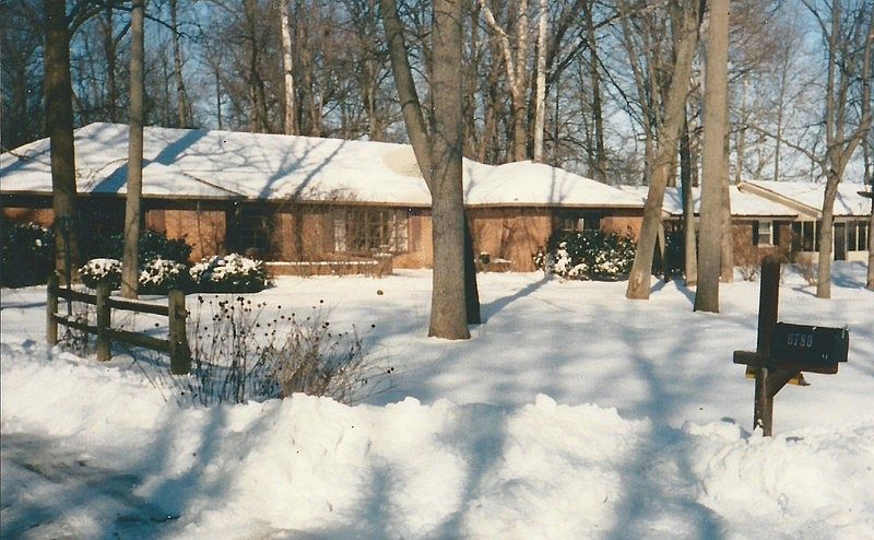Winter Past on Woodcrest Drive
						:
						Front view of home from street.