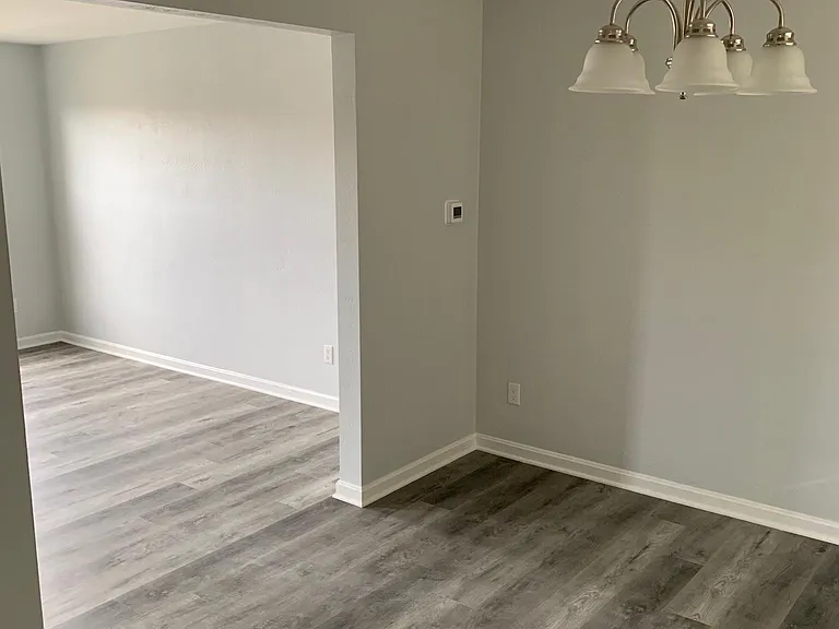 Another angle of dining room and 1st living room