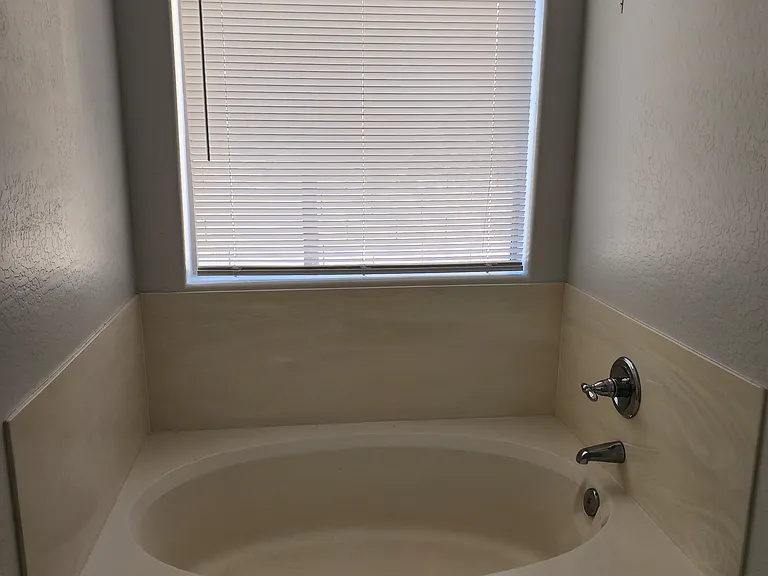 Soaking tub in master bathroom