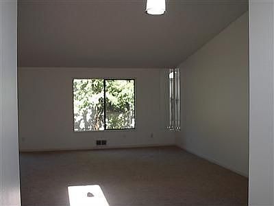 living room with vaulted ceiling