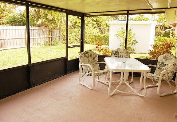 Fully Fenced Backyard with Screen Enclosed porch