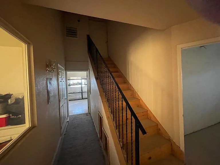 stairs to loft storage area