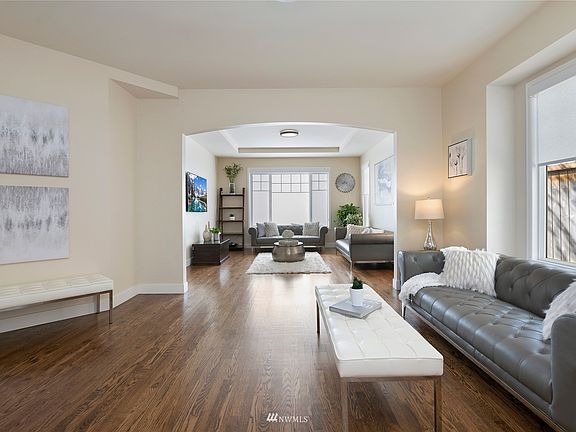 Flexible options: Use as an oversized family room or as a formal living room with adjoining formal dining room. 