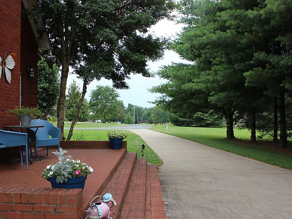 side porch with long drive