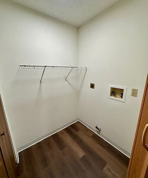 Off the kitchen, the laundry area fits a full-size washer/dryer (not provided). There is a coin-operated washer/dryer in every building