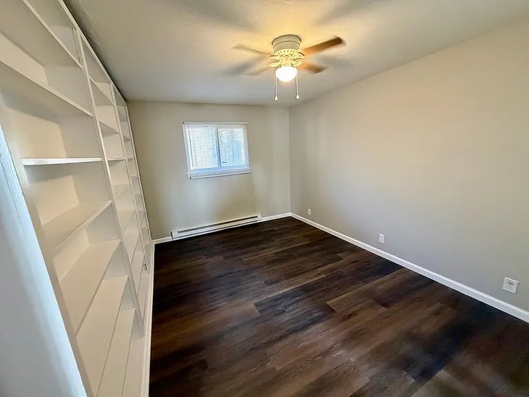 Bedroom with shelf storage