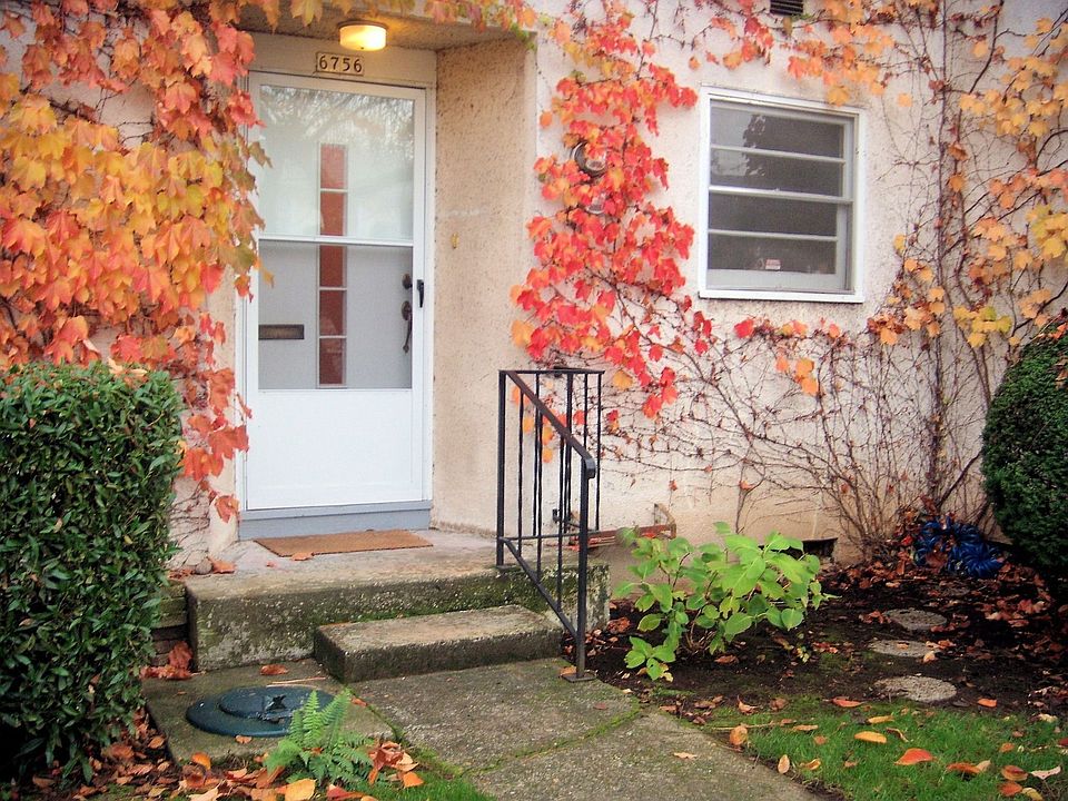 Beautiful exterior with established flowering plants