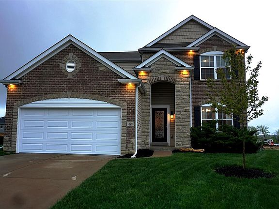 Impressive exterior lighting enhances the architectural features.