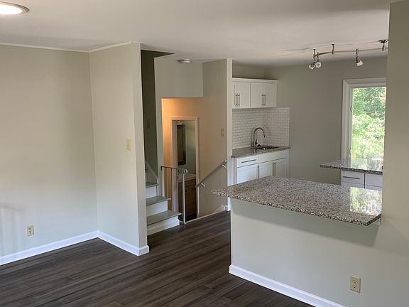 Kitchen from dining room. Two sinks.