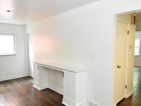 Additional kitchen counter space and cabinets