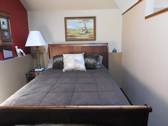 Bedroom area with queen bed