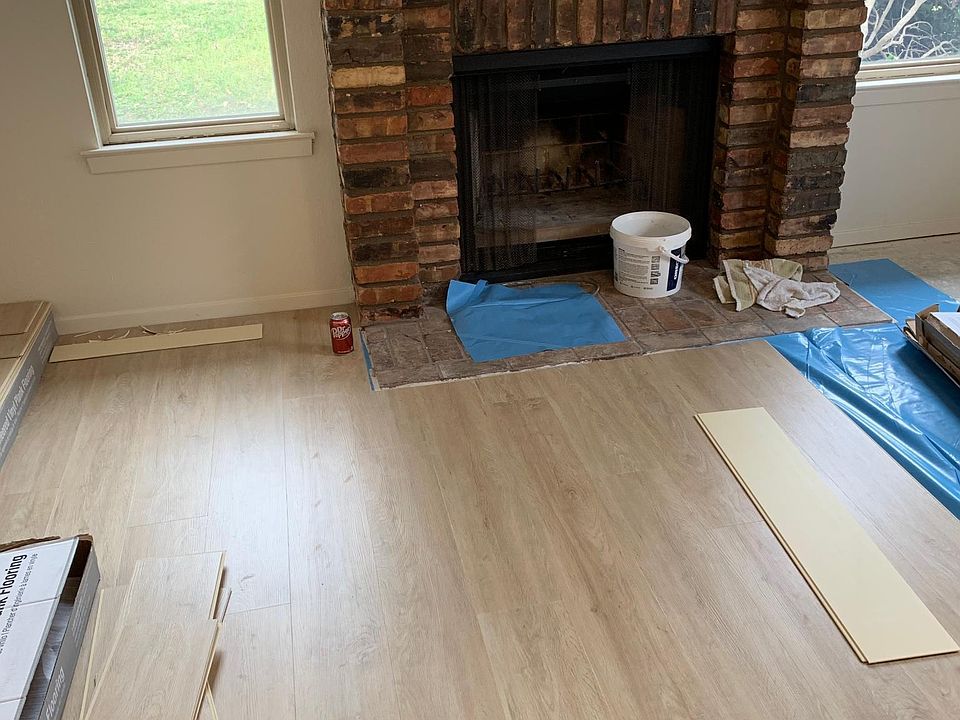 New vinyl plank flooring being installed