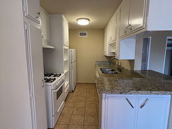 4th image of 6121 Saturn St #203
