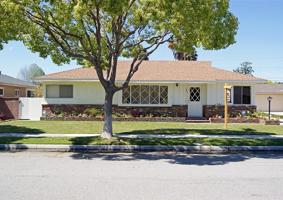 Great curb appeal! Home features new landscaping and large front lawn.