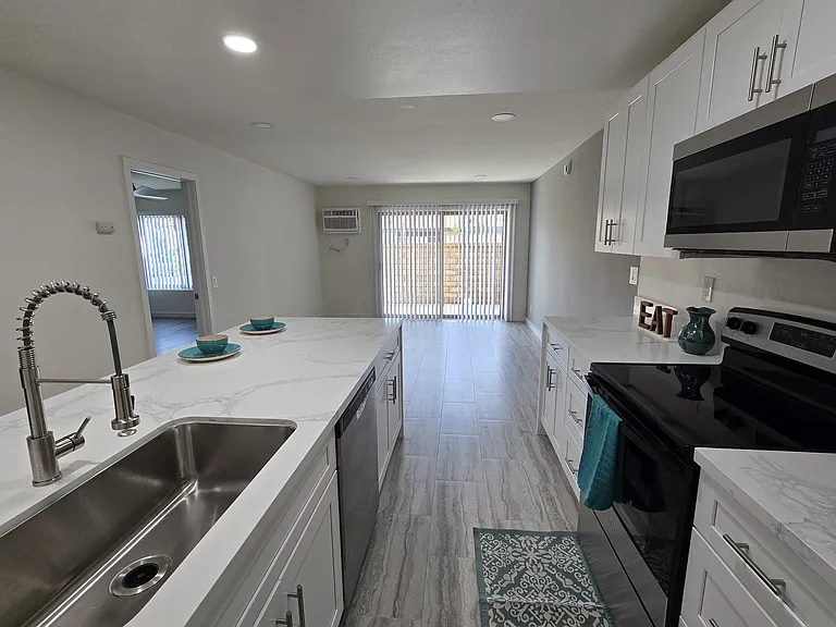 1544 #A7 - View from kitchen to patio