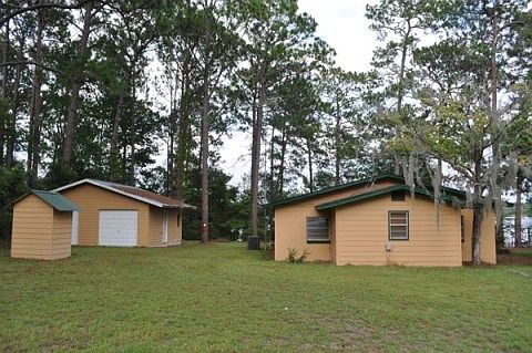 House Garage and Well from road