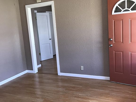Living room looking into bedroom.