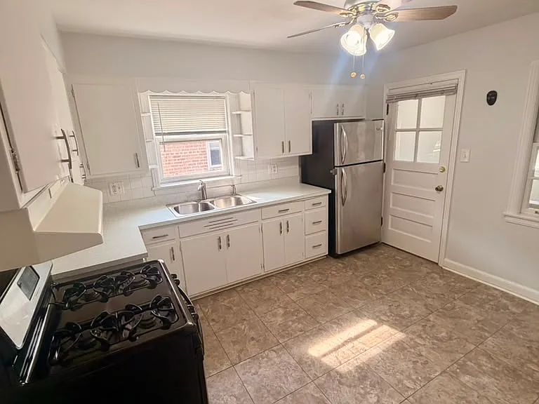 Kitchen with space for dining room