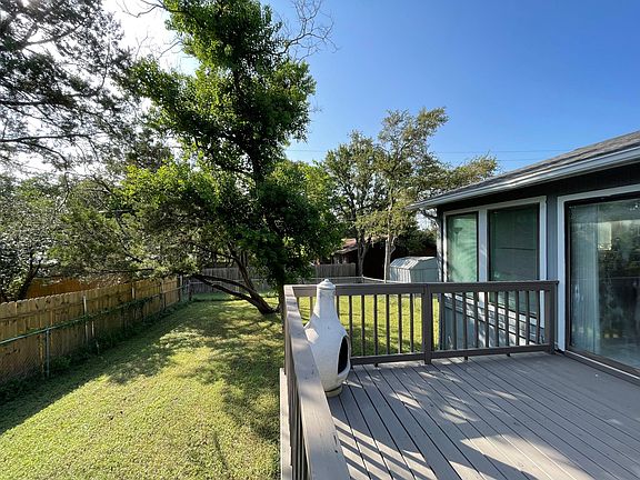 Back yard with a deck.