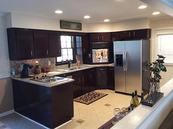Beautiful open concept kitchen with granite counter tops.