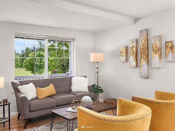 Formal living, fresh paint throughout! Check out the park view!