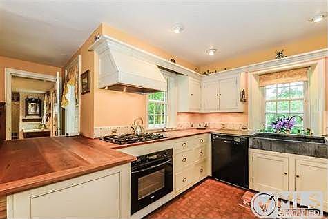 Bosch electric oven, Gas range top & dishwasher.  Washer & dryer in laundry as well as refrigerator included