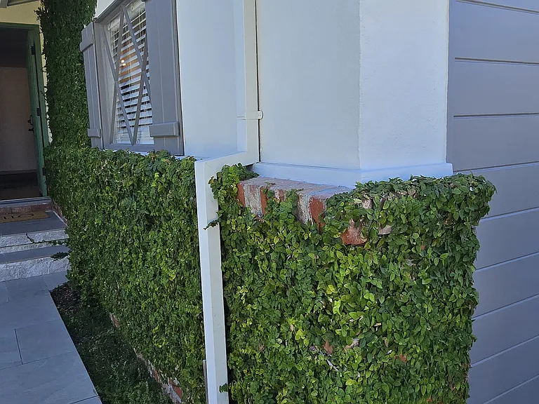 One car garage for storage, at home gym, or other flex space, with remote control entry.