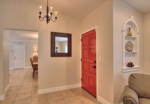 Entry with 17\&quot; Tile Floors and Vaulted Ceilings