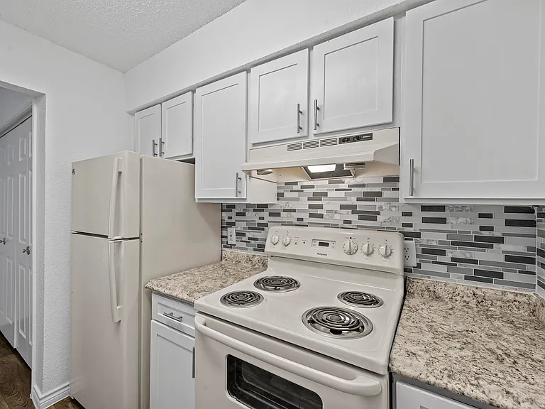 Updated kitchen with beautiful countertops