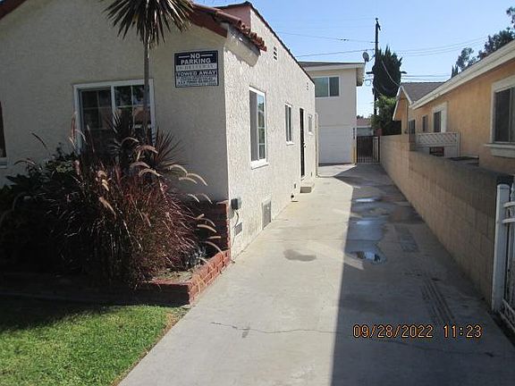 #3 / Driveway to 6028 Falcon / Rear property stand alone upstairs 2 bedroom, 1 bath with Large garage below.