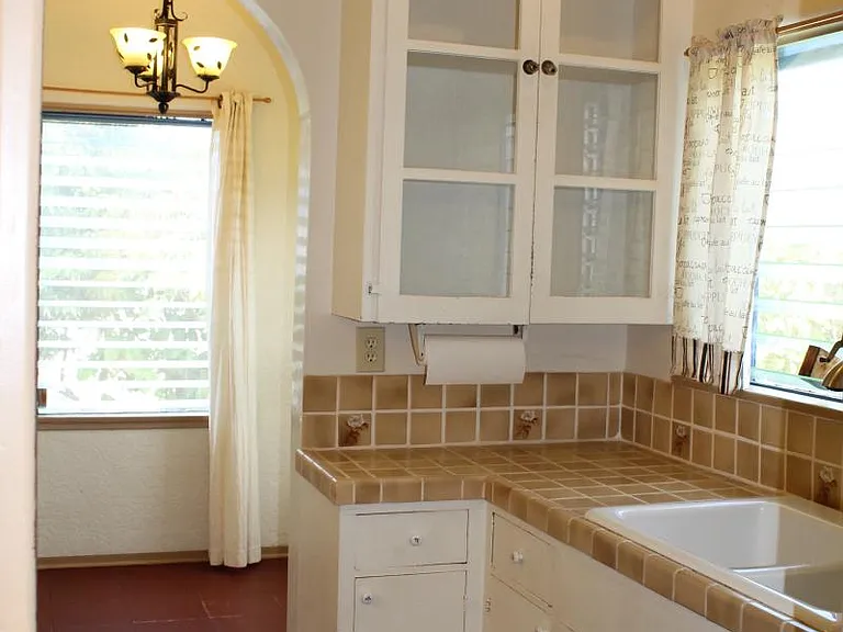Kitchen with breakfast nook/butler pantry behind