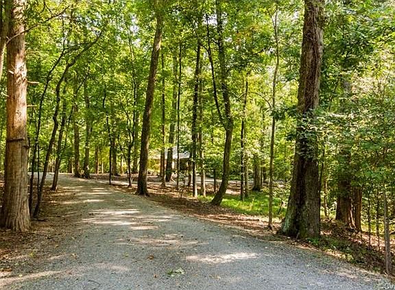Winding drive up to the front of home