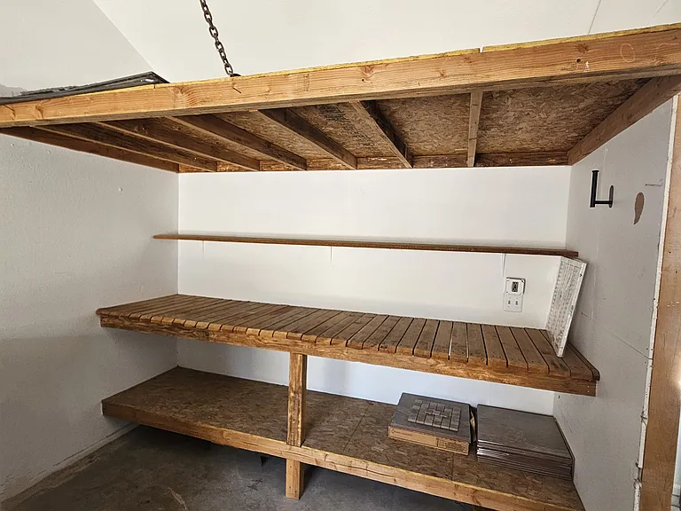 Extra storage and work bench in garage