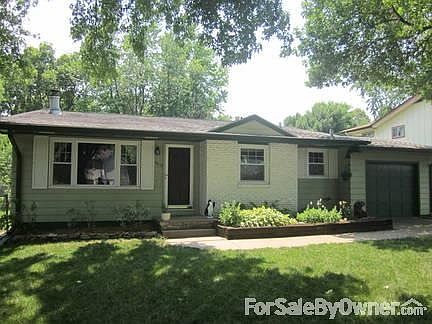 House faces the north and 3 large trees in front yard offer great shade!