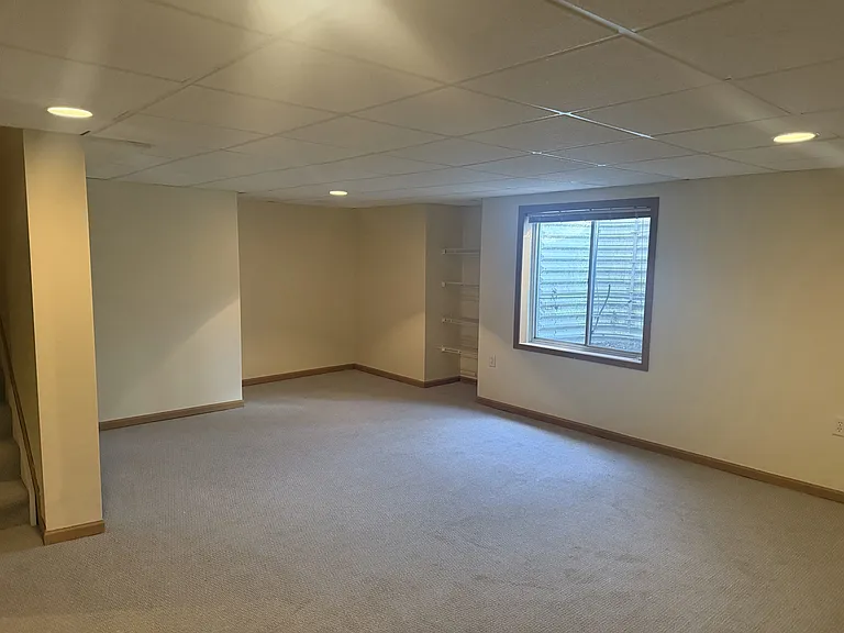 finished, open basement, newer carpet, new paint