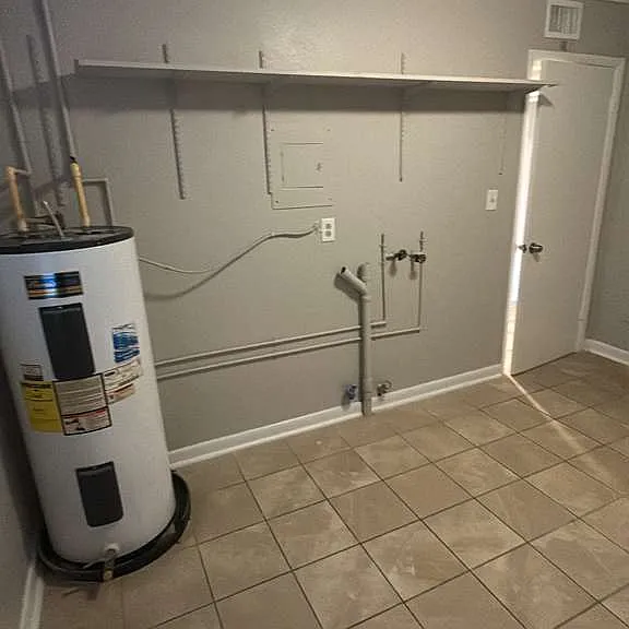 Large Laundry room with storage space
