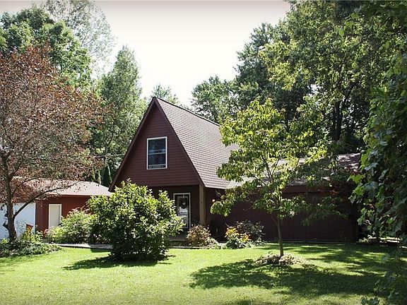 This beautiful A-frame has new siding and a new roof